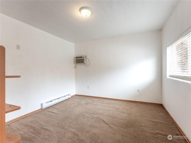 carpeted spare room featuring a baseboard radiator and an AC wall unit