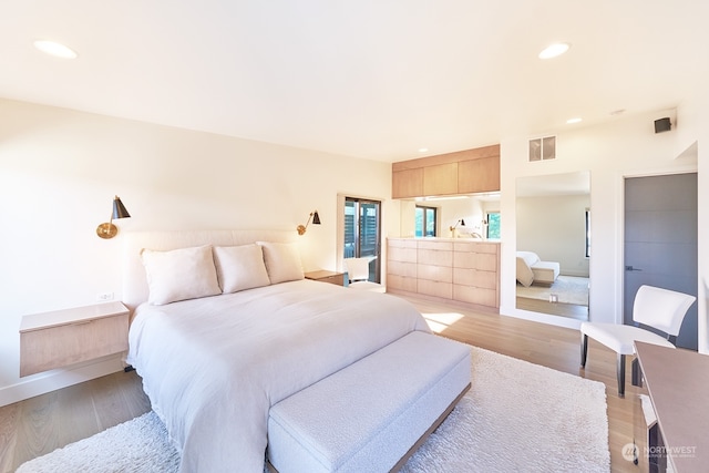 bedroom featuring dark wood-type flooring