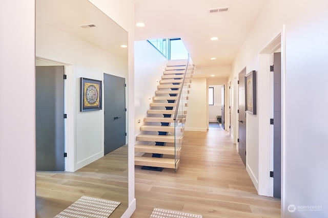 corridor featuring light hardwood / wood-style flooring