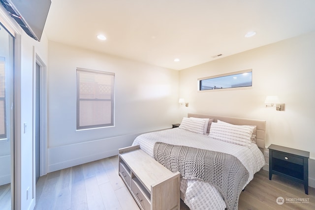 bedroom featuring light hardwood / wood-style floors