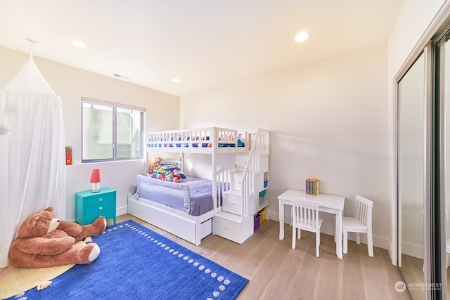 bedroom featuring light hardwood / wood-style floors