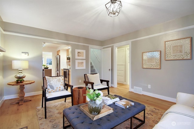 living room with light hardwood / wood-style floors