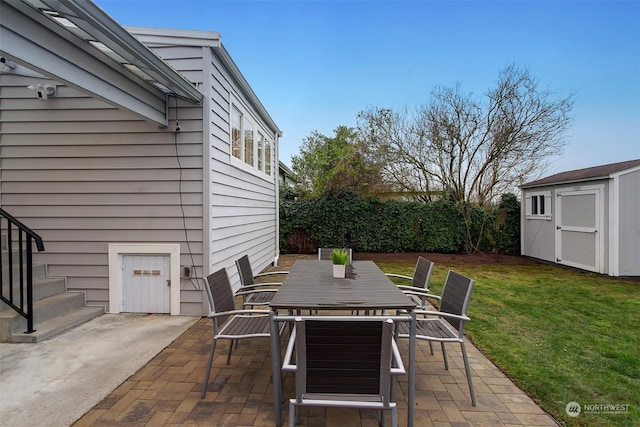 view of patio / terrace featuring a storage unit