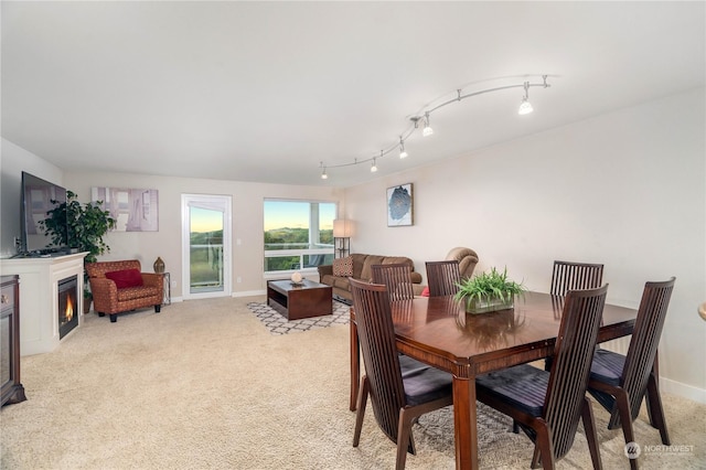 view of carpeted dining space