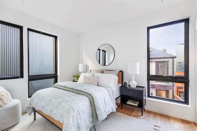 bedroom featuring light hardwood / wood-style floors