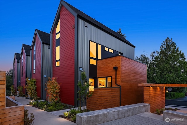 view of property exterior at dusk