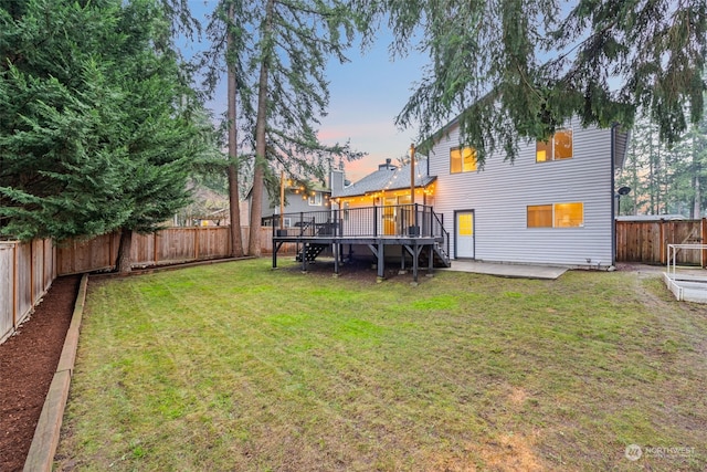 exterior space with a deck and a patio