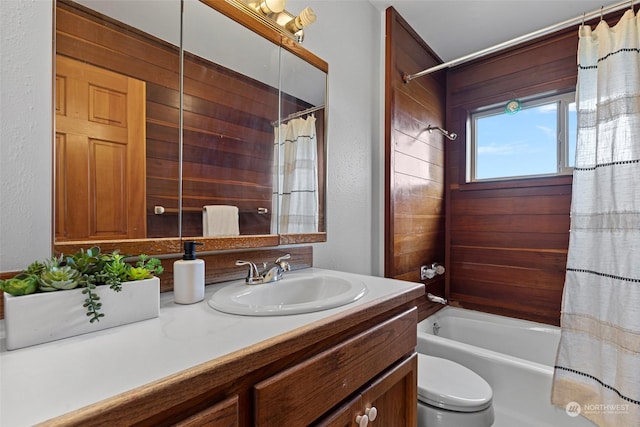 full bathroom featuring toilet, vanity, and shower / bath combo