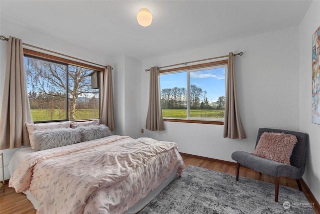 bedroom featuring hardwood / wood-style flooring