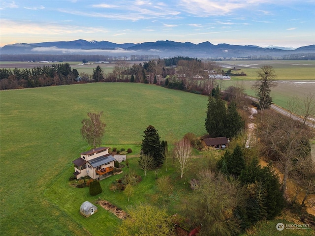 bird's eye view with a rural view and a mountain view