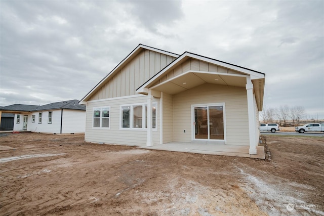 back of house with a patio area