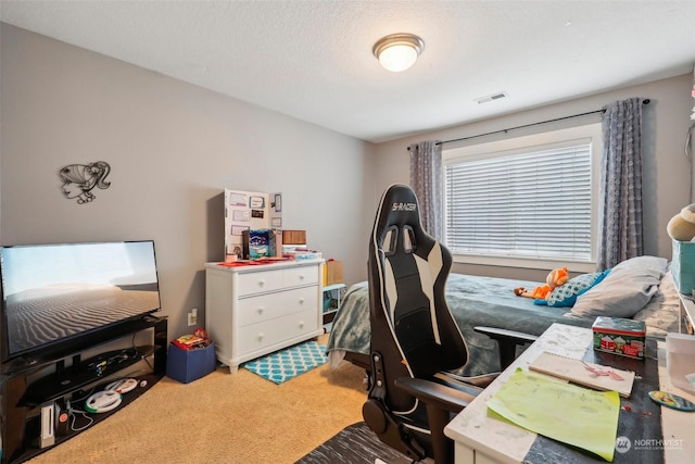 interior space featuring a textured ceiling and carpet flooring