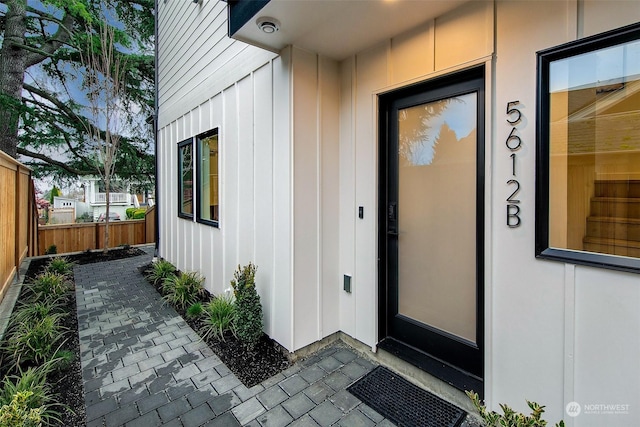 property entrance with a patio area