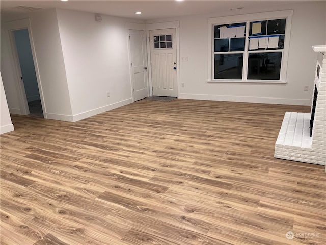 interior space with light hardwood / wood-style flooring