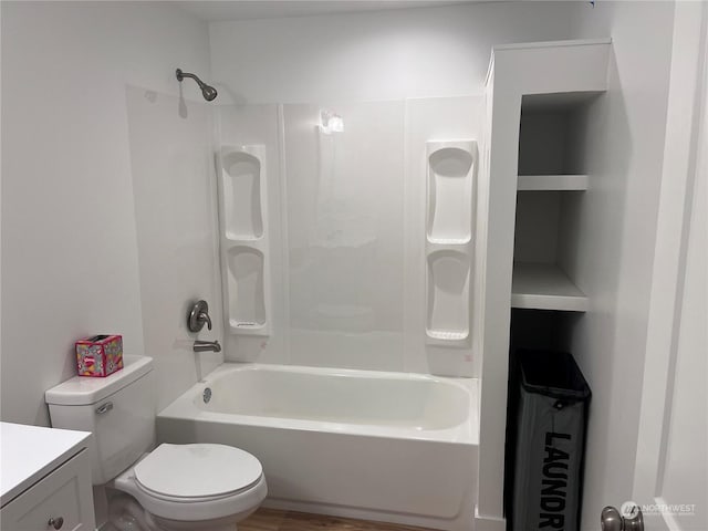 full bathroom with toilet, vanity, bathing tub / shower combination, and built in features