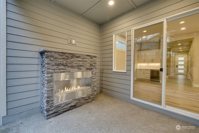 exterior space with a fireplace