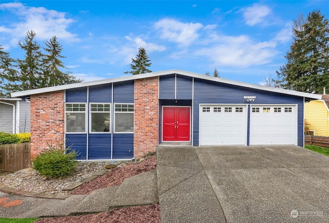 view of front of property featuring a garage