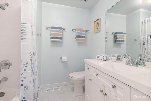 full bathroom with vanity, toilet, and shower / tub combo