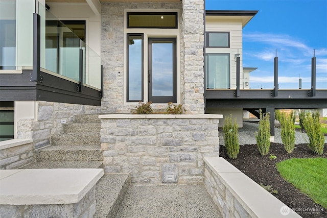 exterior space featuring stone siding