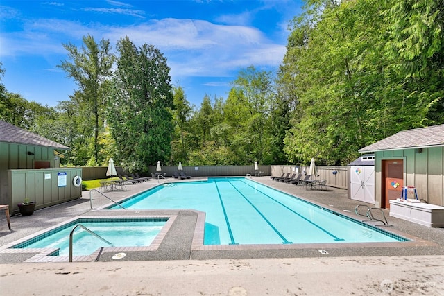5414 Lasiandra Dr, Blaine, WA 98230 - community pool with a community hot tub, a patio, and view of wooded area