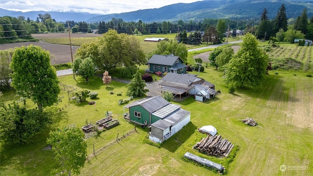 aerial view featuring a rural view and a mountain view