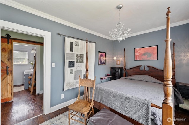 bedroom featuring dark hardwood / wood-style flooring, a barn door, crown molding, and a chandelier