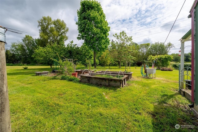 view of community featuring a yard