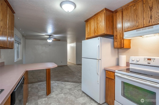 kitchen featuring ceiling fan, white appliances, and a textured ceiling