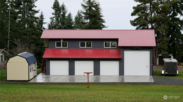 garage with a lawn