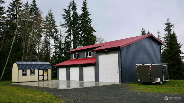 view of outbuilding with a garage