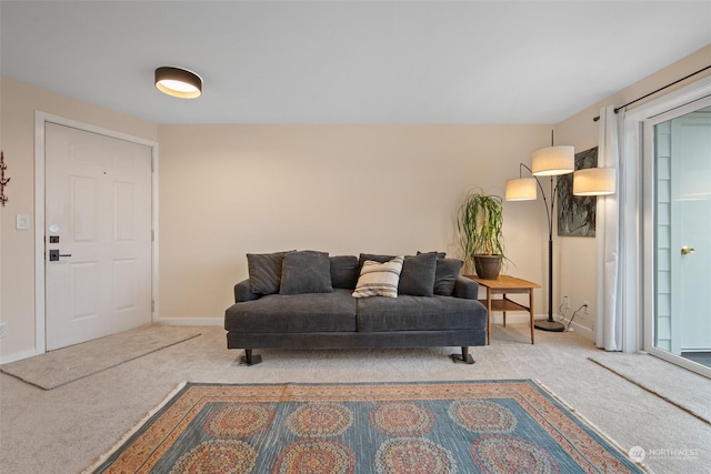 living room with light colored carpet