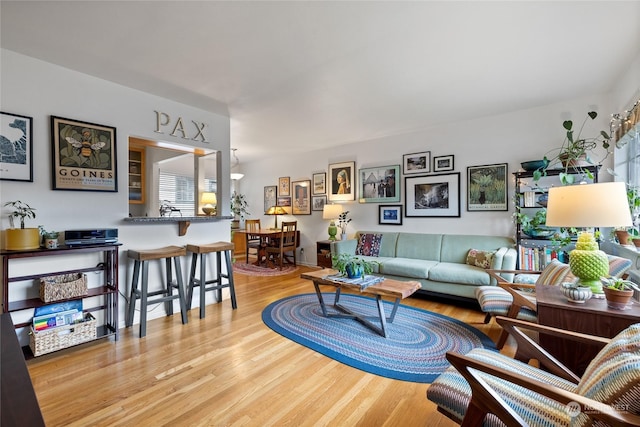 living room with light hardwood / wood-style floors