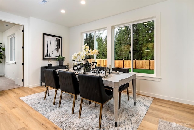 dining area featuring hardwood / wood-style flooring