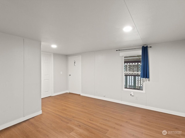 unfurnished room featuring wood-type flooring