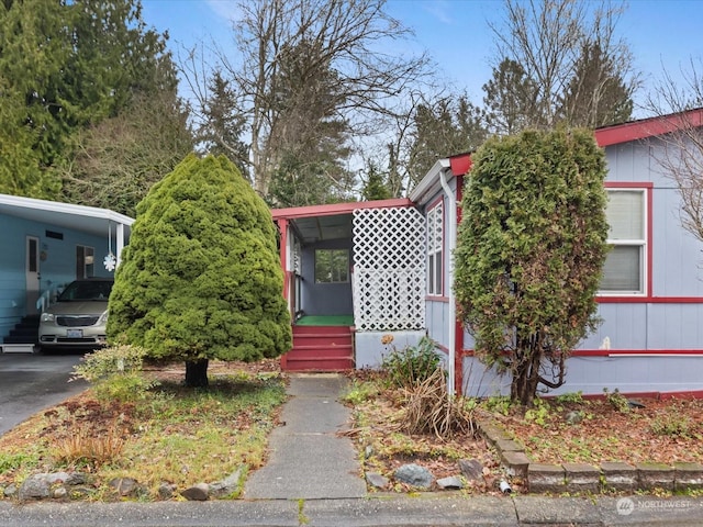 view of front of house with a carport