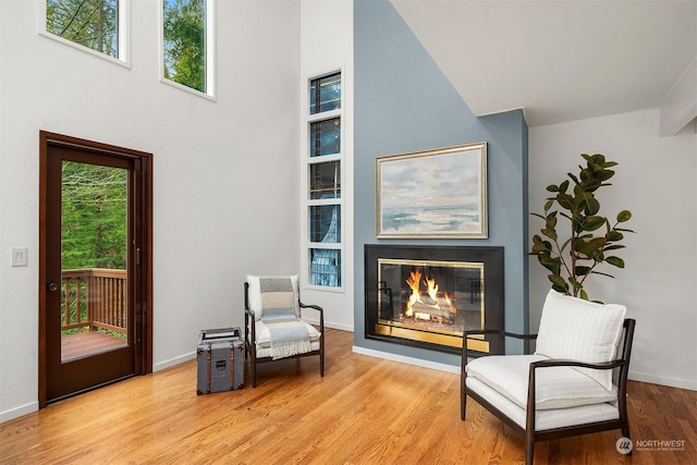 sitting room with light hardwood / wood-style floors