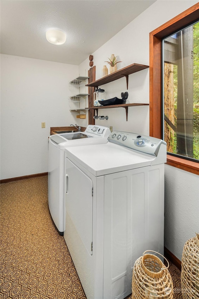 laundry area with washer and clothes dryer