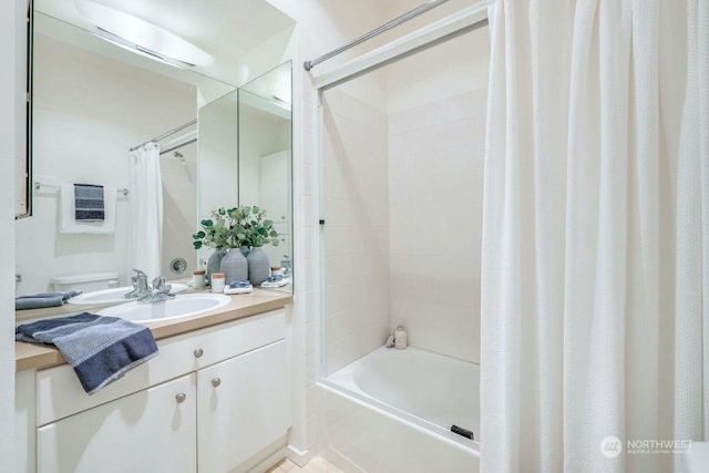 full bathroom featuring toilet, shower / tub combo, and vanity