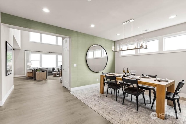 dining room with hardwood / wood-style floors