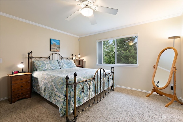 bedroom featuring crown molding, carpet floors, and ceiling fan