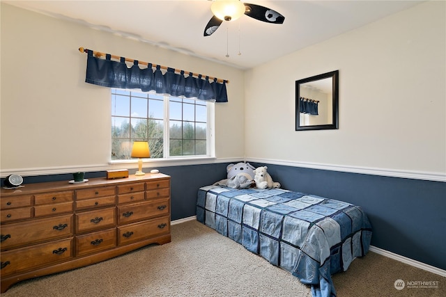 bedroom with ceiling fan and carpet flooring