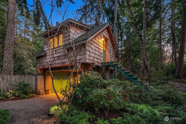 view of property exterior featuring a garage