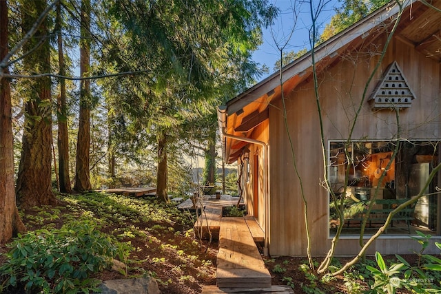 view of side of property featuring a patio