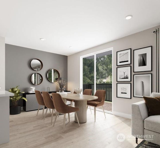 dining area featuring light wood-type flooring