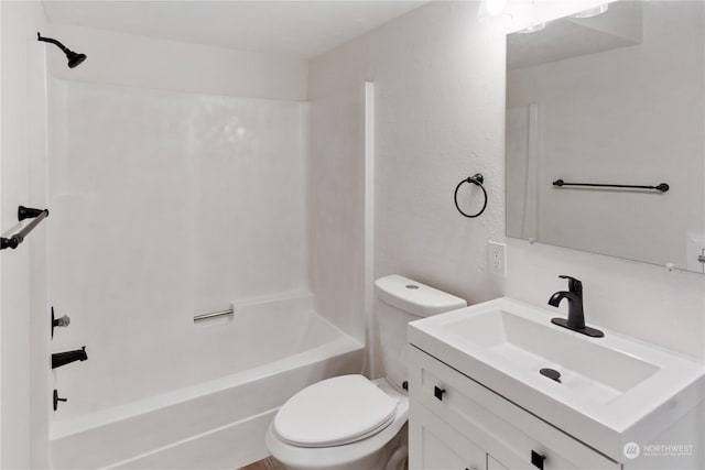 full bathroom featuring toilet, shower / tub combination, and vanity