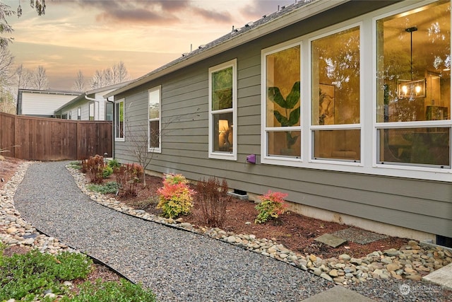 view of property exterior at dusk