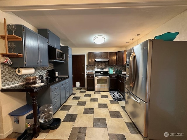 kitchen with appliances with stainless steel finishes, pendant lighting, and dark brown cabinetry