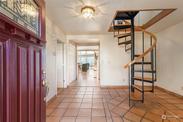 view of tiled foyer entrance