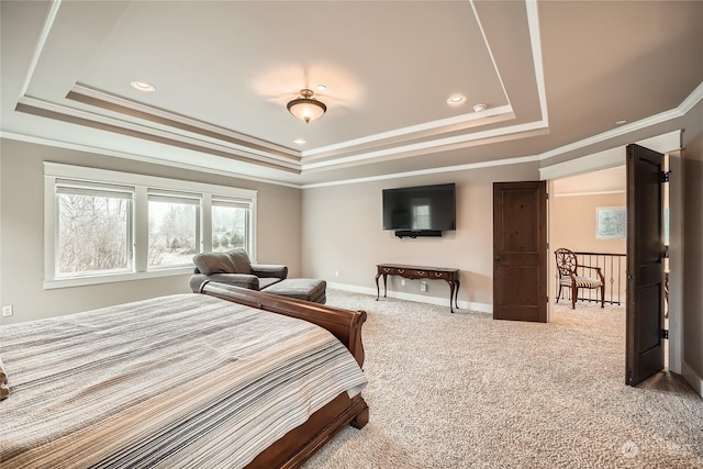 carpeted bedroom with ornamental molding, baseboards, a raised ceiling, and recessed lighting