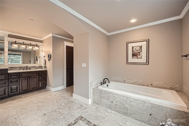 bathroom with crown molding, vanity, and tiled bath